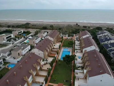 an aerial view of a resort near the beach at Ideal house at the Beach in Sagunto(Valencia) in Sagunto
