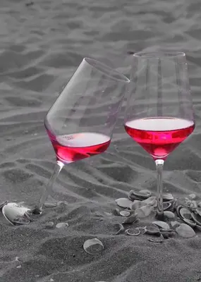 two glasses of wine in the sand on the beach at UIM Mediterraneo PB Aragon A Wifi in Puerto de Sagunto