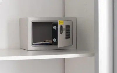 a microwave on a shelf in a wall at Budget Inn in Valencia