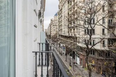 a view of a street from a balcony of a building at Mon Suites Benlliure in Valencia