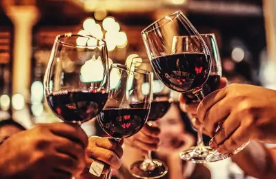 a group of people holding up wine glasses at UIM Mediterraneo Buenavista Wifi in Puerto de Sagunto