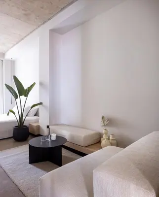 a living room with a couch and a table at YOURS boutique stay in Valencia