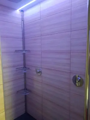 a bathroom with a glass shower and a sink at Burriana Centro in Burriana
