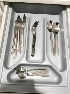 a white tray with silver utensils in a sink at Estudio en el Corazón de Valencia al lado Catedral in Valencia