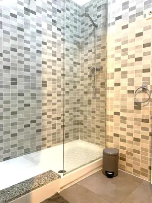 a shower with a glass door in a bathroom at 2 Apartamento TERRAZA Free Wifi in Valencia