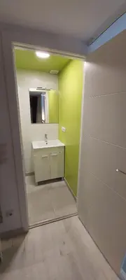 a bathroom with a sink and a mirror at valencialoft in Valencia