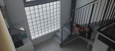 an overhead view of a staircase with a window at valencialoft in Valencia