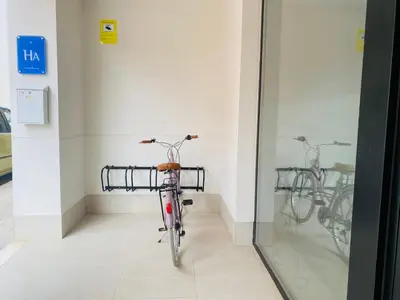 a bike in a room with two bikes in a wall at STUDIO Palomar - PalomarGroup in Alfara del Patriarca