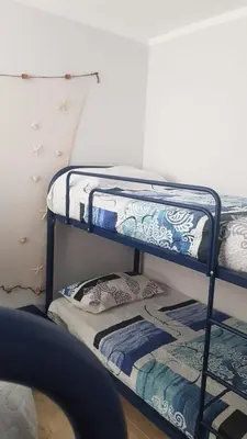 a couple of bunk beds in a room at SUN&BEACH Moncofar in Moncófar