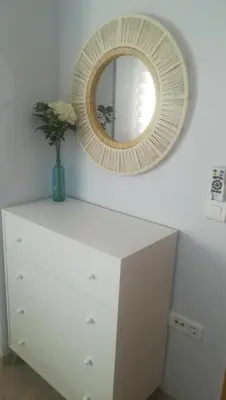 a white dresser with a mirror on top of it at SUN&BEACH Moncofar in Moncófar