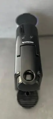 a close up of a cell phone sitting on a table at Fetén in Valencia