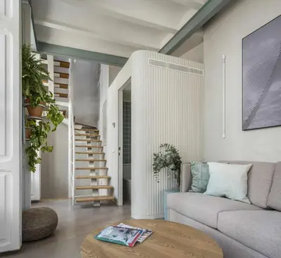 a living room with a couch and a table at APARTAMENTO CENTRO DE VALENCIA PRECIOSA TERRAZA in Valencia