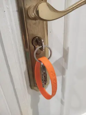 an orange object is attached to a door at Comoda y moderna HABITACION DOBLE in Valencia
