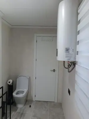 a kitchen with white cabinets and a sink and a dishwasher at APTMUNDO ALTAMAR.- Precioso apartamento 1ª planta + terraza . Para 4 in Puerto de Sagunto