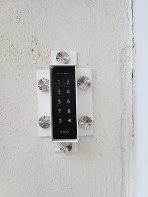 a clock on the side of a wall at Studio Sorolla - Spacious studio near Valencia's beaches in Valencia