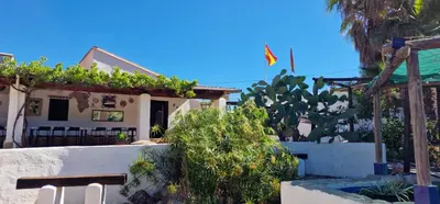 a house with plants on the side of it at Casa Azahara your Valencian Villa in Macastre