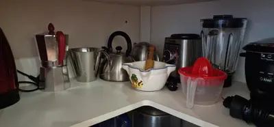 a counter top with various kitchen utensils on it at Casa Azahara your Valencian Villa in Macastre