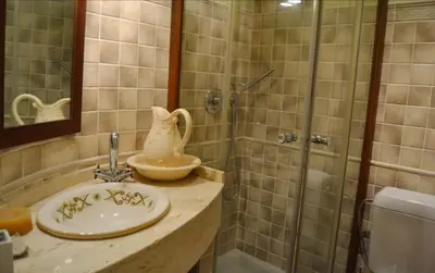 a bathroom with a sink and a shower at Valencia Green Penthouse in Valencia