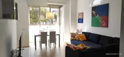 a living room with a couch and a table at Sunny&Beach in Valencia in Valencia