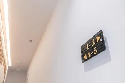 a clock on a door in a room at Sunny,Private Terrace,Wheelchair access in Valencia