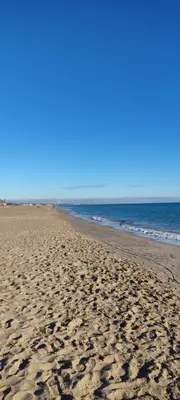 a sandy beach with the ocean in the background at Balcón del Mar in Canet de Berenguer