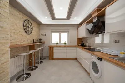a kitchen with a washer and dryer at DREAM HOUSE in Burriana