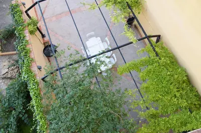 an overhead view of a table and chairs in a garden at Casa Lucía in Requena