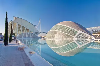 a view of a building with a pool of water at Rooms near the Beach Cabanyal and Universities in Valencia