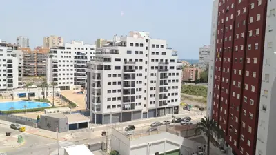 an aerial view of a city with tall buildings at Espectacular apartment vistas al mar y tranquilidad 10 min desde Valencia in Puebla de Farnals