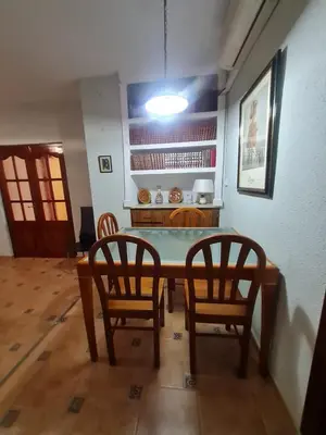 a dining room with a table and two chairs at Casa Rural Los Pequeños (Monserrat) in Monserrat