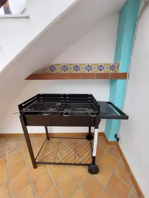 a small table in the corner of a room at Casa Rural Los Pequeños (Monserrat) in Monserrat