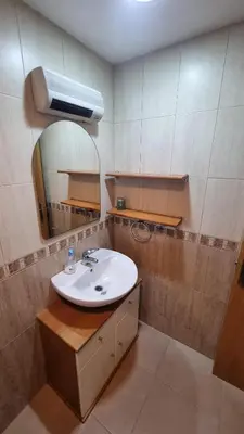 a bathroom with a sink and a mirror at Apartamento Casa Camacho in Burriana