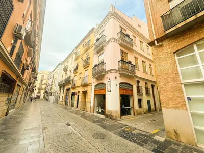 an empty street in a city with buildings at Duplex en el Carmen 2 in Valencia