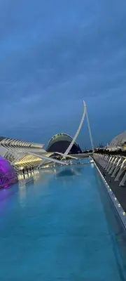 a large building with a swimming pool in front of it at Lyesblb in Valencia