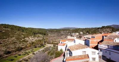 an aerial view of a town with buildings at Torre Buen Aire cerca de Valencia, con jacuzzi y barbacoa in Benafer