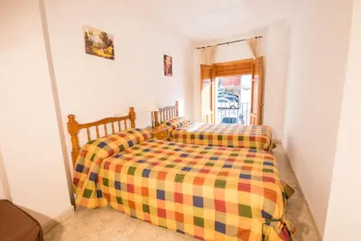 a bedroom with two twin beds in a room at El Maestro in Caudiel