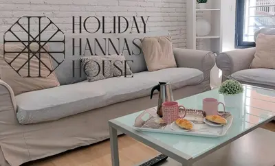 a living room with a couch and a coffee table at Holiday Hanna’s House in Valencia
