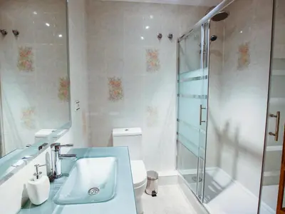 a bathroom with a shower and a sink and a toilet at Total Valencia Xàtiva (Leisure & Culture) in Valencia
