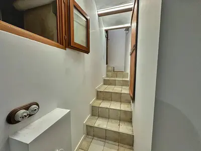 a staircase in a house with a door and a window at Dulces Sueños Pilar in Valencia