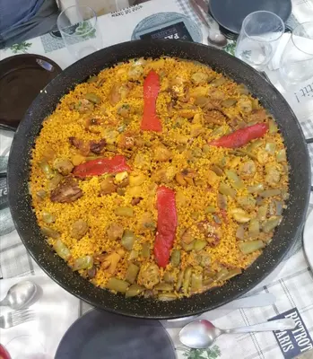 a pan filled with food on top of a table at Villa Isabelle in Barraca de Aguas Vivas