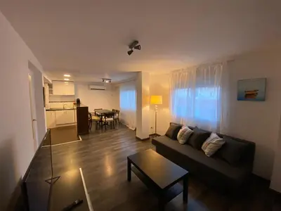 a living room with a couch and a table at AMPLIO Y LUMINOSO APART Cerca del CENTRO HISTORICO LM in Valencia