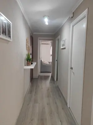 an empty hallway of a apartment with a hallway at Apartamento rural Casa Calo in Losa del Obispo