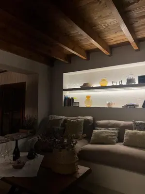 a living room with a couch and a table at ruralhome callemayor in Altura