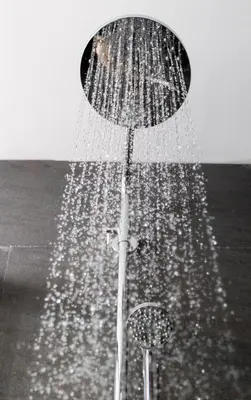 a shower with water coming out of it at Hotel Kramer in Valencia
