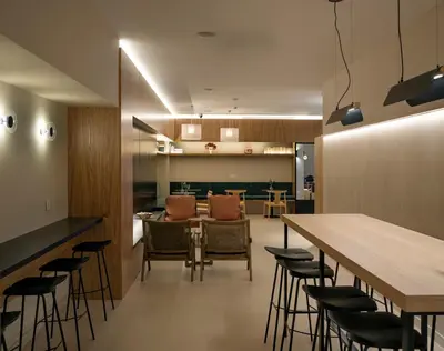 a dining room with a long table and chairs at Mythic Valencia in Valencia