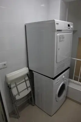 a washer and dryer sitting in a room at Apartamentos Alogia, Pastora, Yerbater in Segorbe