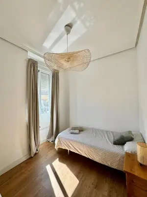 a bedroom with a bed and a ceiling at Vlc Center 4 Room Apartment in Valencia