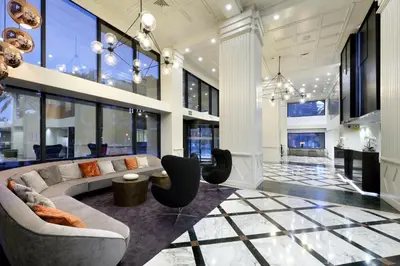 a large living room with a couch and chairs at Exe Rey Don Jaime in Valencia