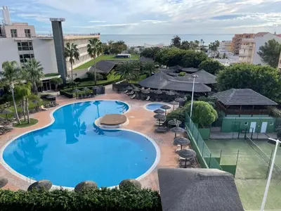 an overhead view of a swimming pool at a resort at AGH Canet in Canet de Berenguer