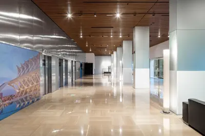 an empty hallway in an office building with wooden ceilings at Barceló Valencia in Valencia